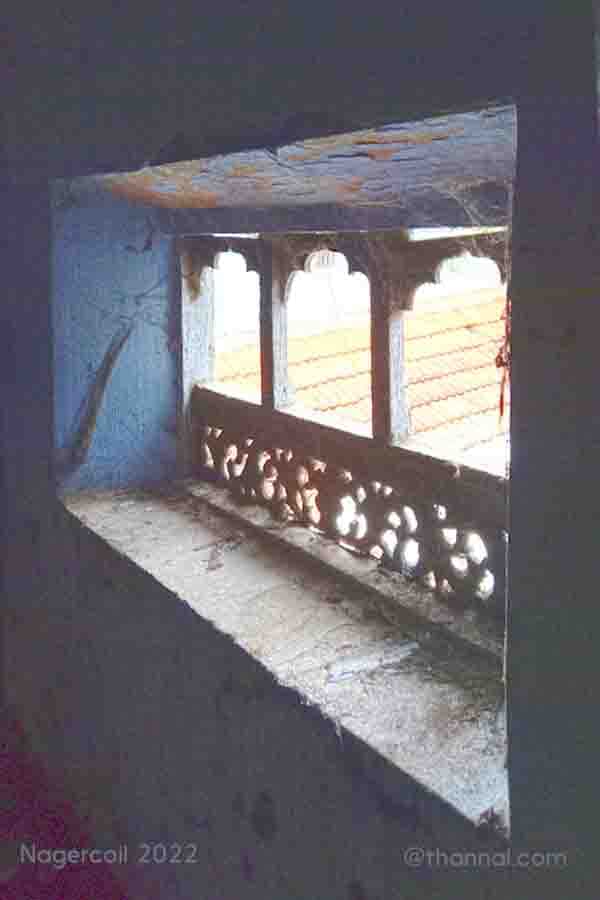 Window from attic overlooking courtyard